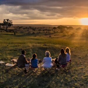 Family on safari at Karen Blixen Camp in the Mara North Conservancy