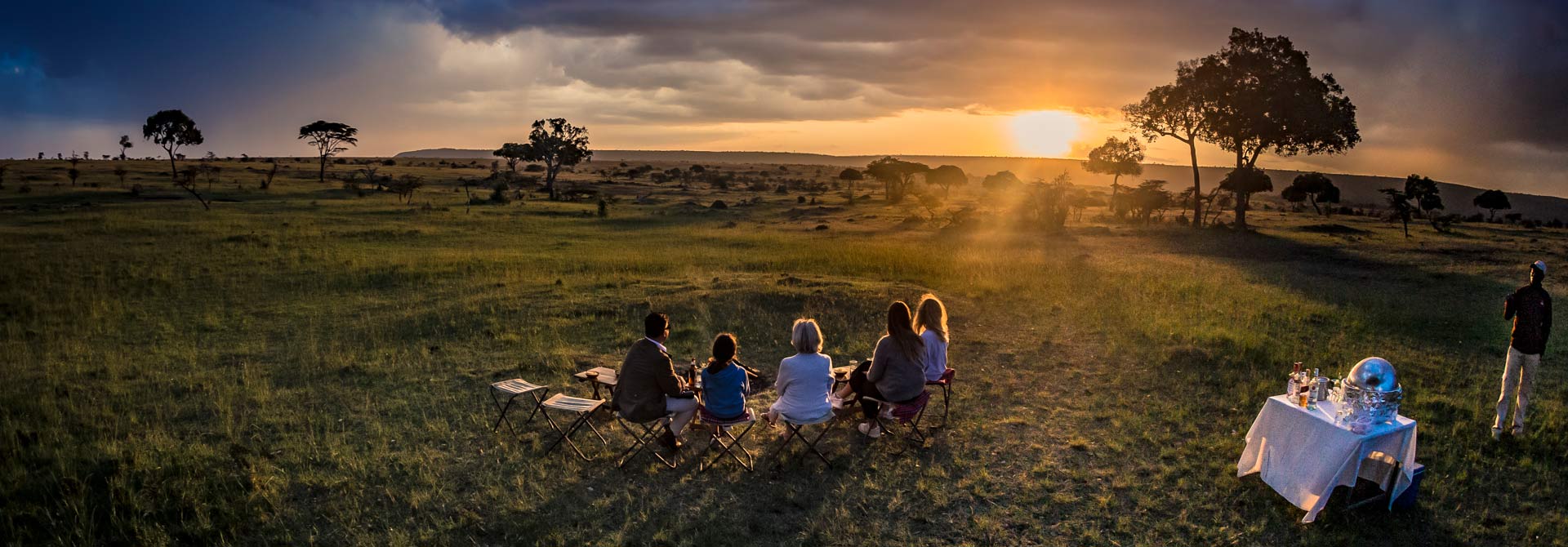 Family on safari at Karen Blixen Camp in the Mara North Conservancy